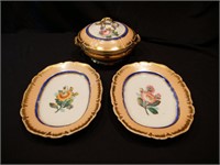 Pair of gilt-edged serving platters and matching