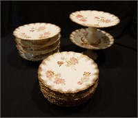 Vintage scalloped-edged plates and cake stands