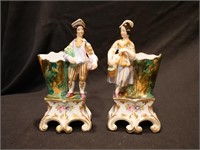 Pair of porcelain gilt painted figural vases