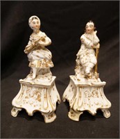 Pair of gilt painted figurine stem vases