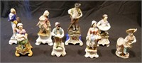 8 assorted hand painted figurines