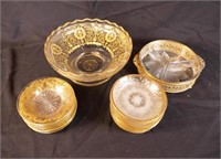 Group of glass dishes with gold filigree