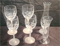 Avon lead crystal wine glasses and bud vases.