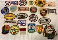 ASSORTED EMBROIDERED PATCHES AND STAMPS