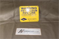 Petroleum Pipeline And Hercules Engine Signs