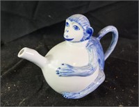Blue and white monkey teapot