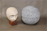 Carved Stone Head And Hollow Concrete Ball
