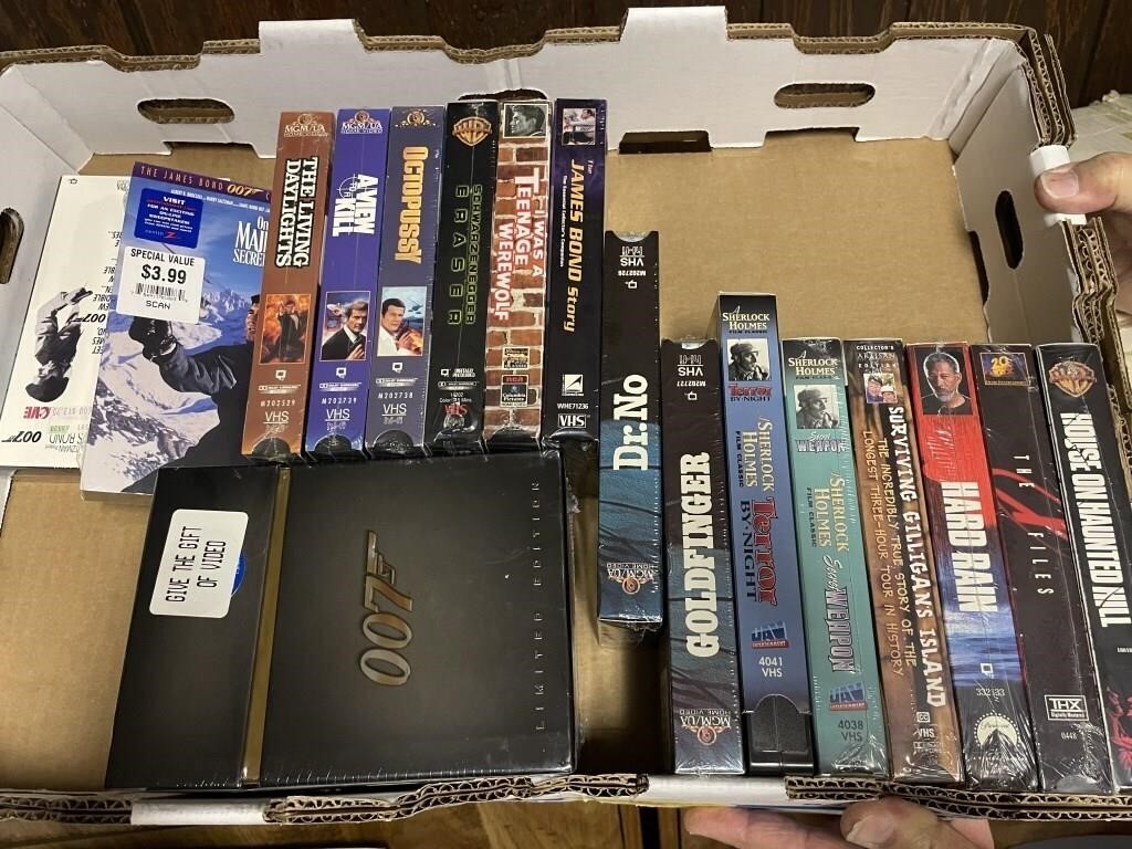 Large flat of NEW VHS movies (James Bond mostly)