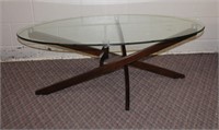 Beveled glass top oval coffee table with wood