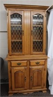 Maple china hutch, 2 drawers over 2 raised panel