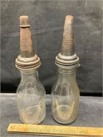 2 vintage oil bottles