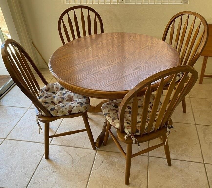 60 - ROUND TABLE W/ 4 CHAIRS & CUSHIONS