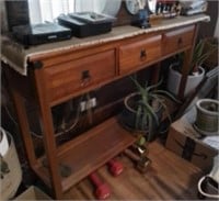 Couch table, 4' l, 3't, 12" d, items on stand not