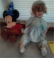 Mickey Mouse doll and porcelain doll