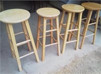 4 wooden stools