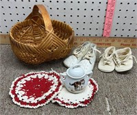 Woven egg basket, 1911 wool felt baby shoes,