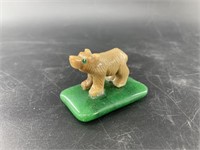 Stone carving of a bear on green stone base  1.5"