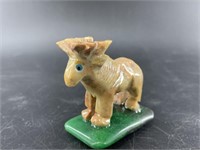 Stone moose on a green stone base  2.25" tall