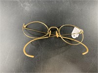 Pair of antique gold filled wire frame spectacles,