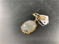 Gold filled pin with a polished agate cabochon