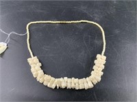 Small hand carved bone beaded necklace