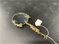 Small magnifying glass on a lanyard chain