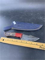 Damascus bladed knife with wood and Kirinite scale