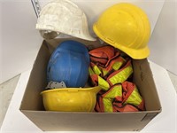 4 construction helmets & 2 safety vests