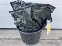 Lot of water bags for trees in planter
