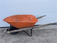 Orange metal wheelbarrow