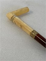 Antique cane with precious material handle and