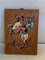 Oil painted made in the USA hanging wooden cowboy