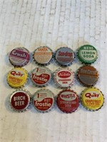 12 unused bottle cap