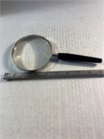 Black handled magnifying glass