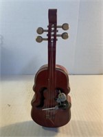Wooden violin with wooden mouse that goes