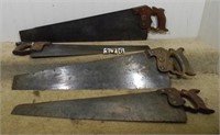 Four various hand saws. Three are marked H.