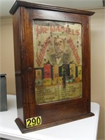 Dr. DANIELS Vet. Med. Tin Faced Wood Cab, 21x29