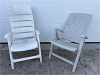 2 folding plastic patio chairs