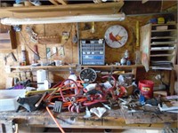 TOOLS AND ITEMS ON WORK BENCH AND WALL