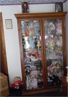 LIGHTED DISPLAY CABINET WITH DOLL COLLECTION