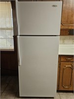 Whirlpool Refrigerator w Ice Maker. See photos