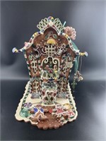 Gingerbread Palace figurine with music box and car