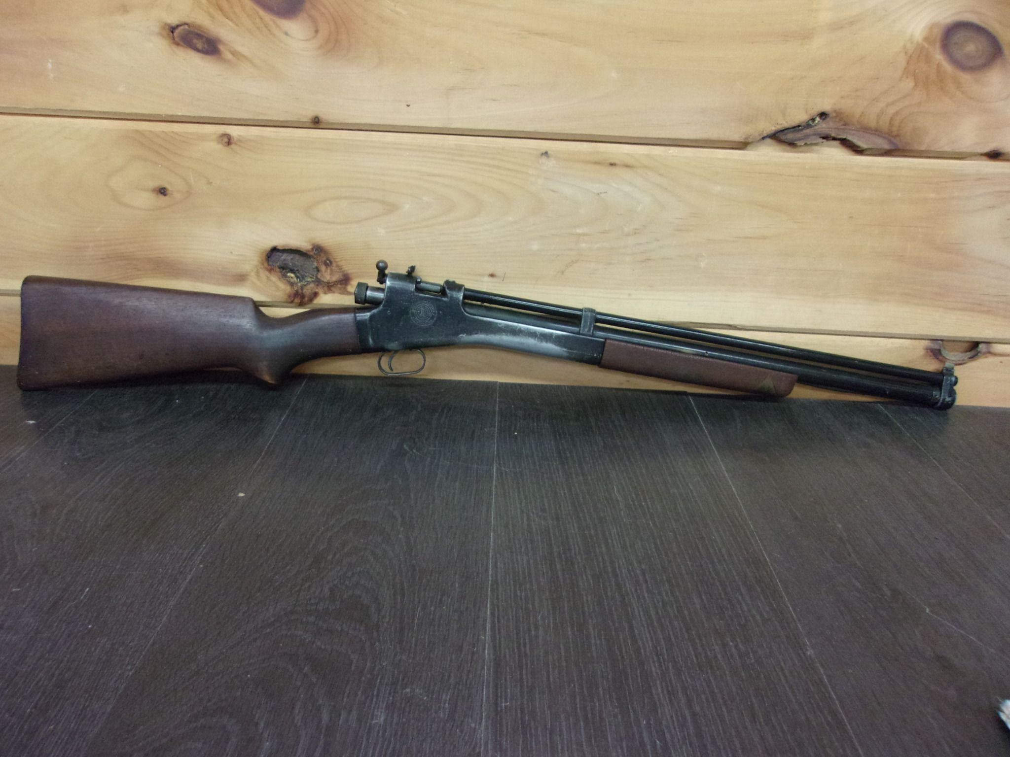 old crosman arm rifle