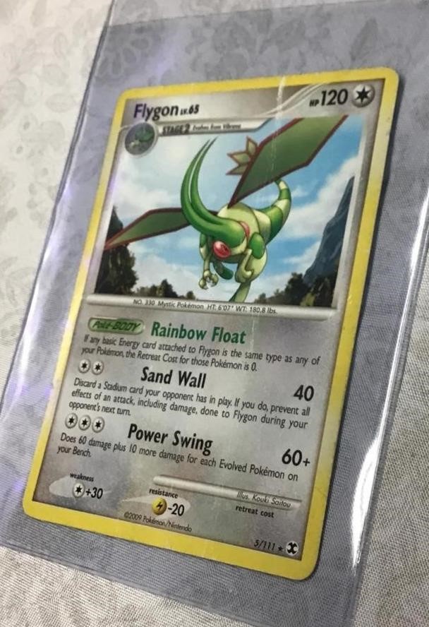 Pokémon card w/ case