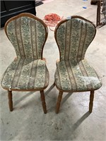 2 oak sitting chairs. See decorative backs