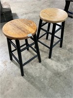 2- black wooden bar stools
