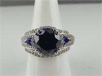 THREE STERLING FAUX TANZANITE RINGS - SIZE 9