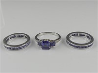 THREE STERLING FAUX TANZANITE RINGS - SIZE 7.5, 9