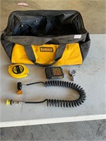 Dewalt tool bag, battery, Stanley tape measure all