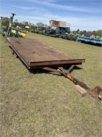 Brown tilt 2 axel flatbed trailer 12’ long